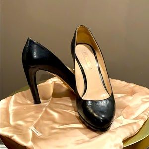 Prada black high heel platform pumps